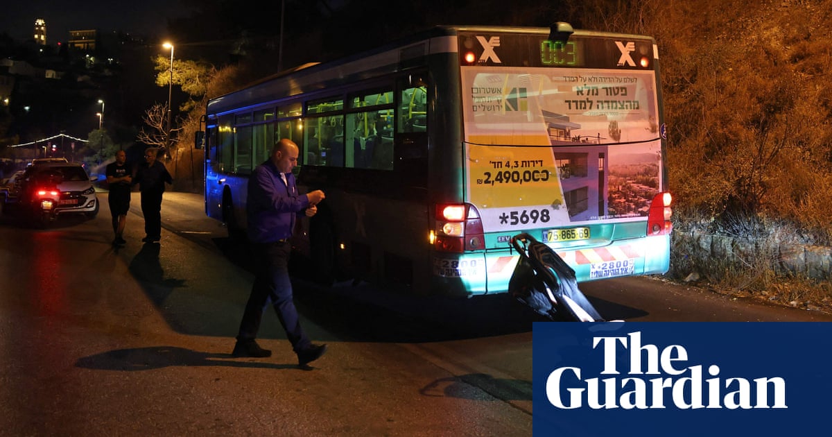 Jerusalem shooting: eight wounded as gunman fires at bus near Western Wall - the guardian