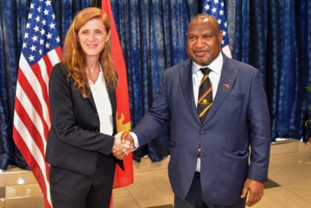 Papua New Guinea’s prime minister James Marape shakes hands with USAid administrator Samantha Power.
