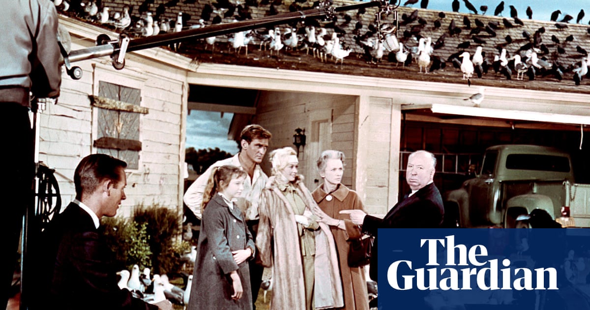 Handcuffs, dog bites and avian warfare: how personal grudges sullied Alfred Hitchcock’s reputation