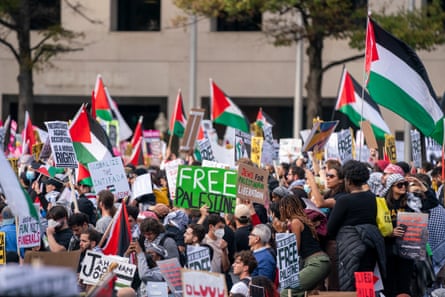Pro-Palestinian activists and protesters rally in Freedom Plaza, calling for a ceasefire and a free Palestine in Washington, DC on 4 November 2023.