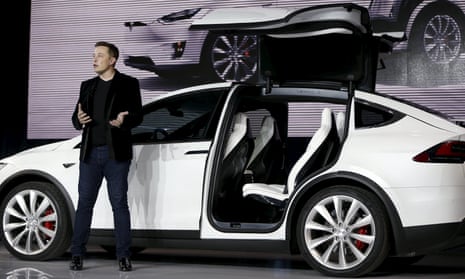 Tesla Motors CEO Elon Musk introduces the falcon wing door on the Model X electric sports-utility vehicles during a presentation in Fremont, California September 29, 2015. Musk is helping create the perception that going green can be cool.