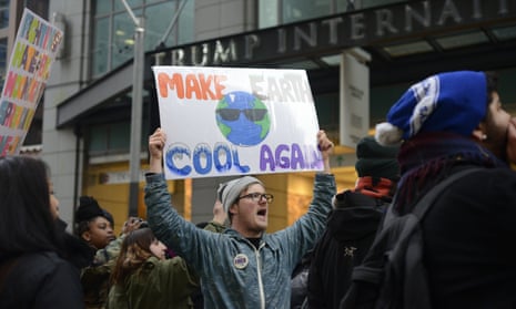 A protester denounces Donald Trump’s climate policy.