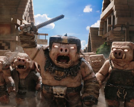 Monsters in A Minecraft Movie, one in the foreground with a chainsaw/sword raised overhead