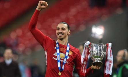 Zlatan Ibrahimovic lifts the English Football League Cup after Manchester United beat Southampton at Wembley.