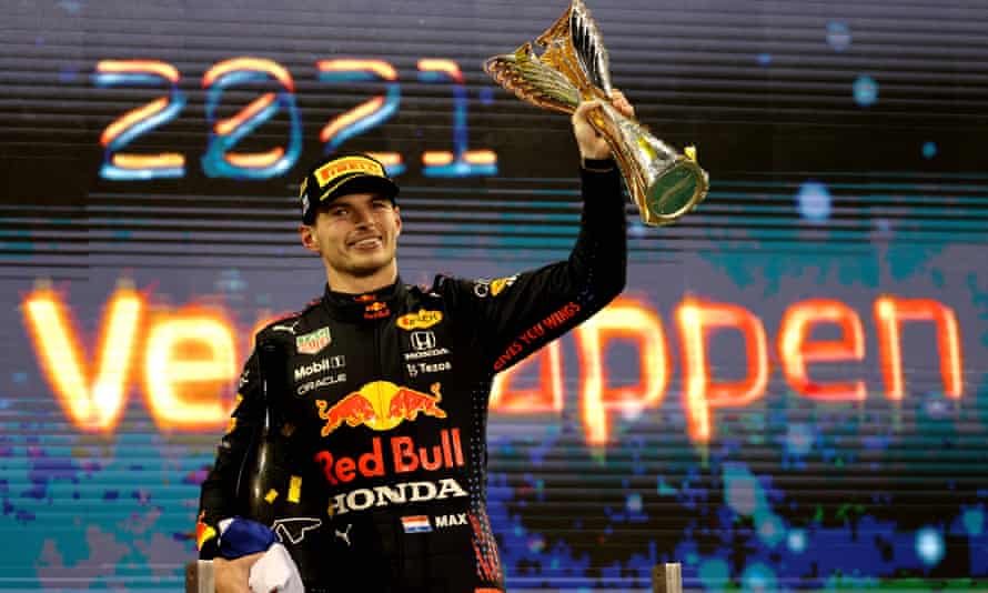 Max Verstappen celebrates after winning the world title in Abu Dhabi.