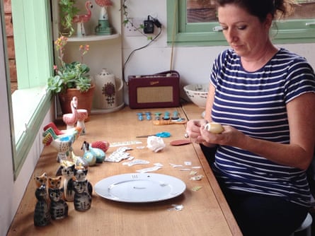 Ceramics artist Hannah Turner in her studio in 2016 with the flamingo egg cup on her desk.