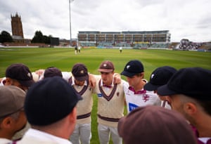 Tom Abell of Somerset speaks to his team before Essex’s reply.
