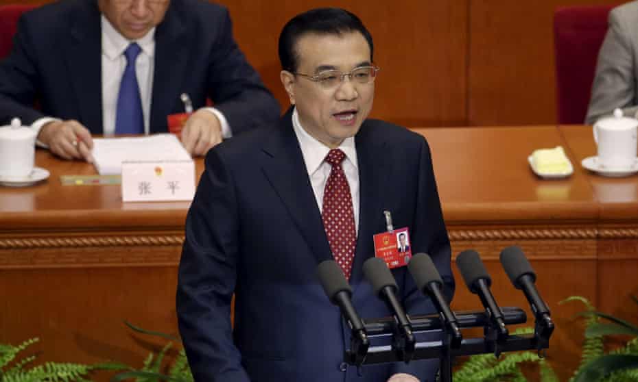 China’s Premier Li Keqiang gives a speech during the opening session of the National People’s Congress in Beijing.