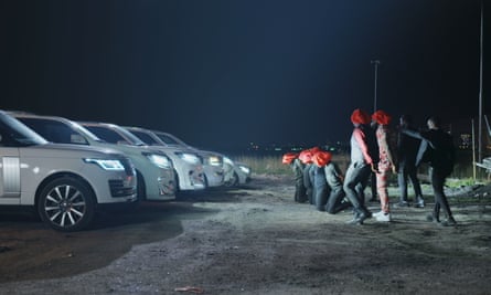 Nigerian film-makers pivot to YouTube as streaming firms pull back A night-time shot of gunmen forced a row of men in orange hoods to kneel in front of a row of cars with their headlights on