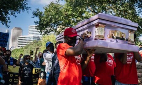 Activists in Austin, Texas, carried a coffin to symbolize the death of voting rights, during a 27-mile march for democracy in July. 