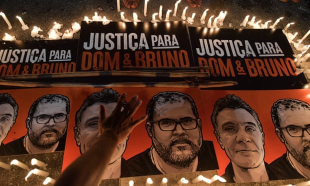 Posters calling for justice of British journalist Dom Phillips and Brazilian Indigenous affairs specialist Bruno Pereira
