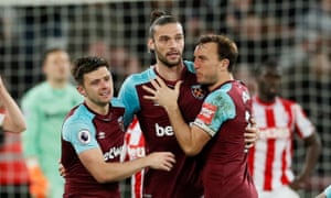 Premier League - West Ham United vs Stoke City<br>Soccer Football - Premier League - West Ham United vs Stoke City - London Stadium, London, Britain - April 16, 2018 West Ham United's Andy Carroll celebrates scoring their first goal with team mates REUTERS/David Klein EDITORIAL USE ONLY. No use with unauthorized audio, video, data, fixture lists, club/league logos or "live" services. Online in-match use limited to 75 images, no video emulation. No use in betting, games or single club/league/player publications. Please contact your account representative for further details.