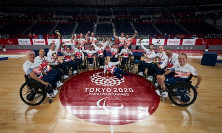 ParalympicsGB’s wheelchair rugby team celebrate winning the gold medal.