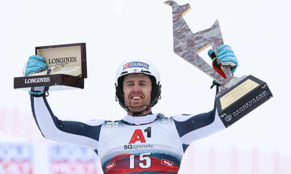 Dave Ryding&nbsp;celebrates with the trophy after earning a historic victory in Austria.