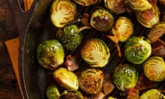 harissa-glazed sprouts with lemon labneh on a white plate