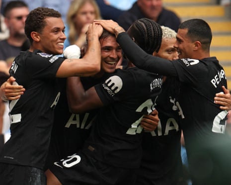 Joao Palhinha (second left) is congratulated after scoring Tottenham’s second goal by Brennan Johnson (left) and Pedro Porro (right).