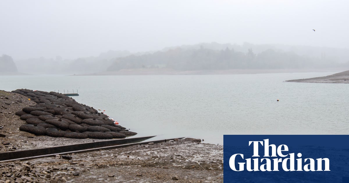 ‘You can see the water going down’: residents on edge as one of England’s worst-hit reservoirs dries up