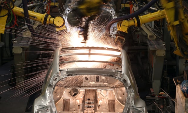 Robotic arms at work in Nissan’s Sunderland car factory