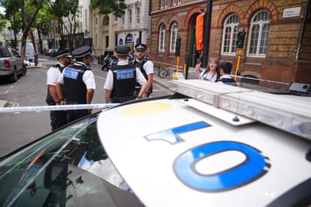 Emergency services near the scene on Endell Street in Covent Garden, central London