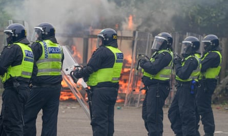 ‘It’s all kicking off’: riot police clash with far-right protesters in Rotherham in August