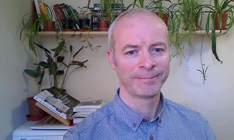 Tony Craig in his home office, with the tumble dryer in the background.