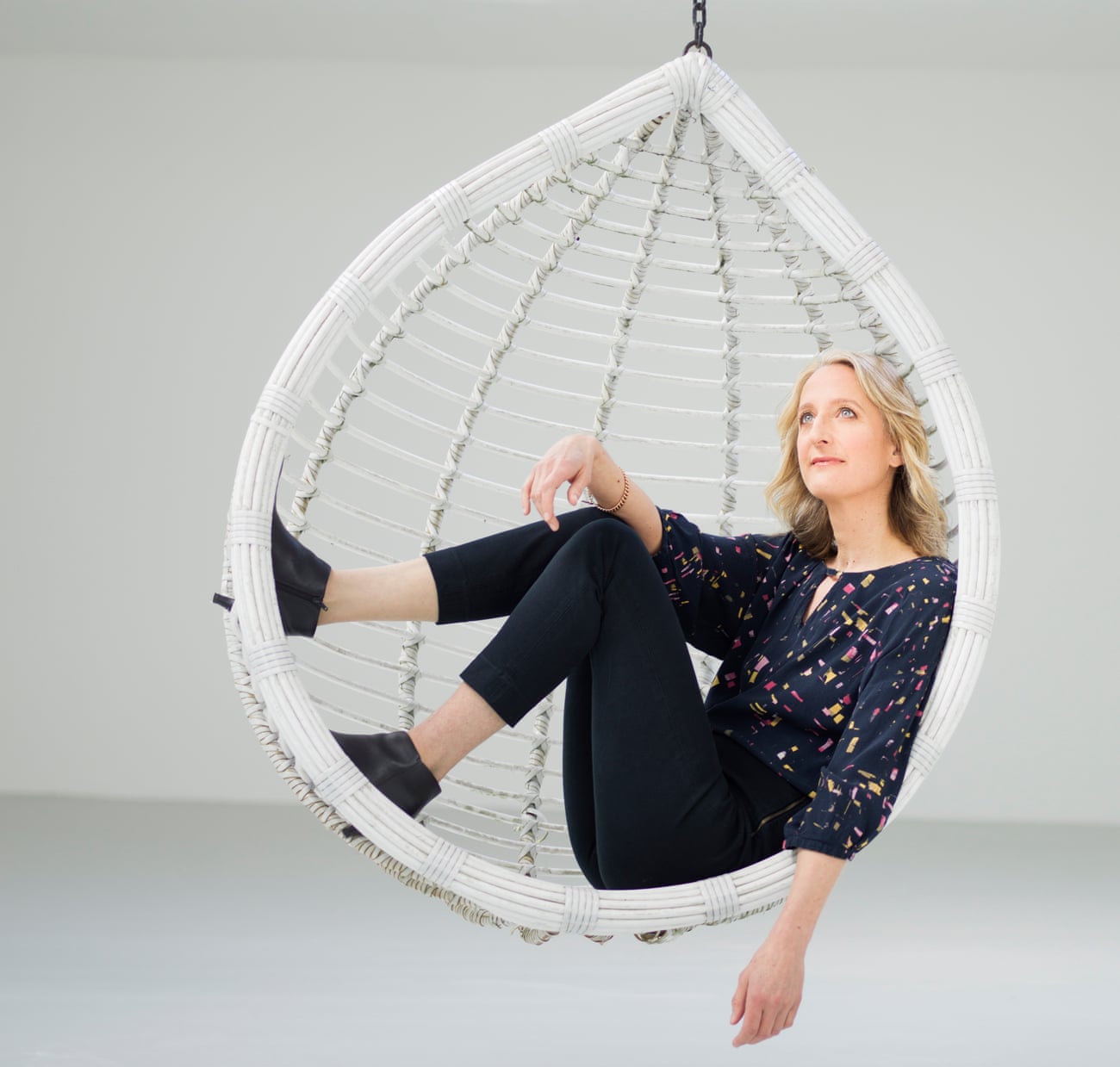 Hannah Booth in a swing chair