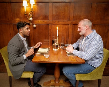 Fraz and Pete chatting across a restaurant table