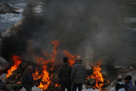 Funeral pyres burn in Jajarkot, Nepal.