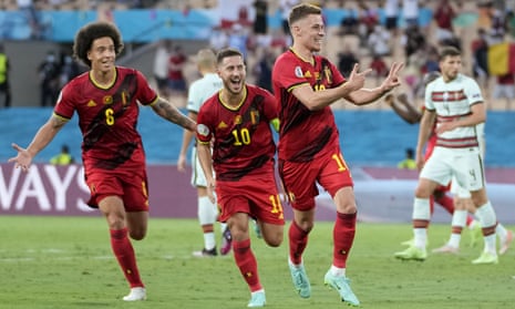 Belgium’s Axel Witsel, Eden Hazard and Thorgan Hazard celebrate the latter’s goal against Portugal. 