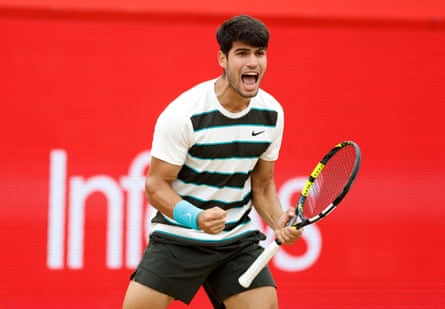 Carlos Alcaraz celebrates winning a point in the final