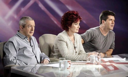 Another era … The X Factor judges Louis Walsh, Sharon Osbourne and Simon Cowell, 2005.