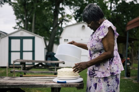 Suffolk, VA -- Catherine Jones preps a Father’s Day cake to share with family in her backyard, which floods whenever heavy rain falls.