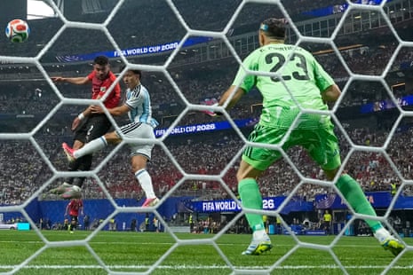 Egypt's Yasser Ibrahim (centre) scores his side's opening goal.