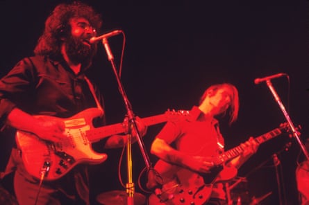 Jerry Garcia and Bob Weir of the Grateful Dead perform on stage