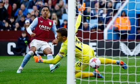 Aston Villa's Jacob Ramsey scores his second goal against Bournemouth's keeper Neto.