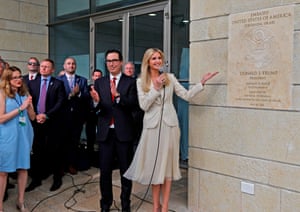 Steve Mnuchin (C-L) claps Ivanka Trump unveils the inauguration plaque at the new US embassy building in Jerusalem