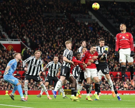 Casemiro of Manchester United (right) heads at goal.