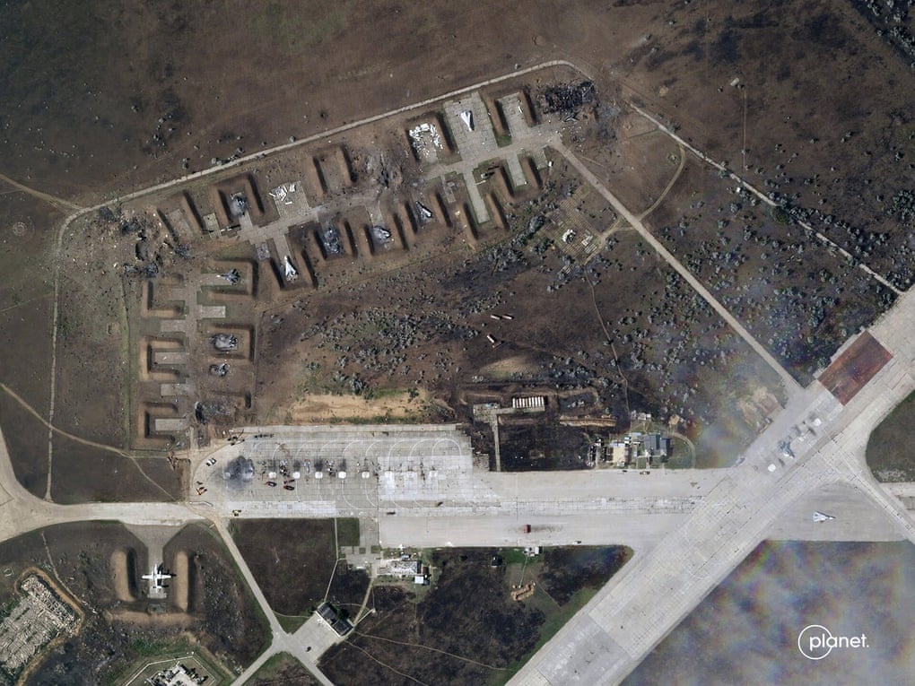 This satellite image provided by Planet Labs shows destroyed Russian aircraft at Saky air base in Crimea after an explosion on Tuesday.