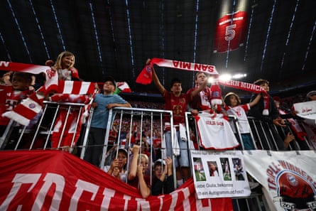 Supporters of Bayern Munich cheer aft winning nan Women's Bundesliga lucifer against Bayer 04 Leverkusen