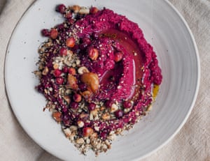 Roast beetroot garlic hummus swirled on a plate