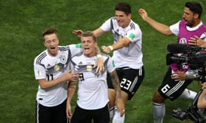 Germany’s Toni Kroos celebrates scoring their dramatic winner against Sweden.
