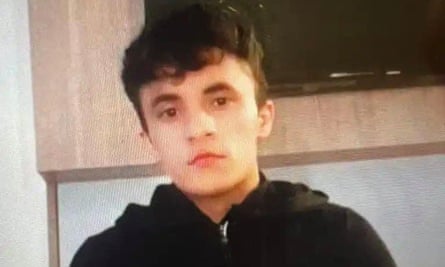 Amir, wearing an Adidas jumper, looking at the camera