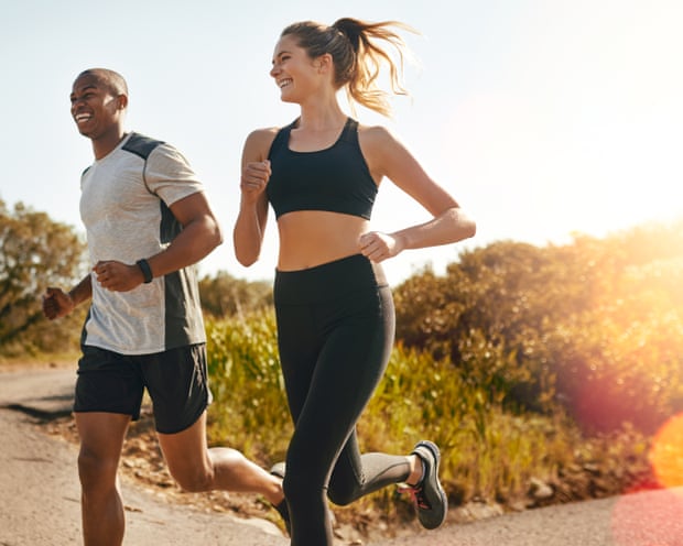Shot of a fit young couple going for a run outdoors