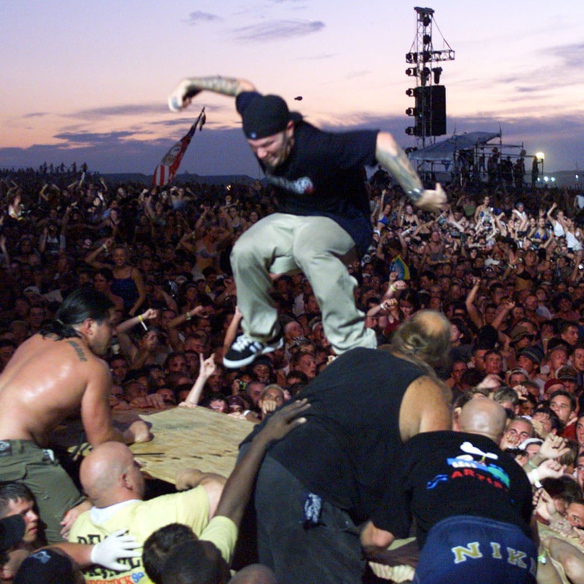 Break stuff! How Limp Bizkit, rioting fans and a huge candle handout led to a music festival fiasco | Documentary | The Guardian