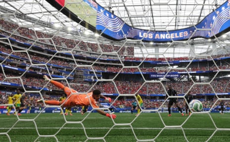 Ronwen Williams of South Africa fails to save a shot from Stephen Eustaquio of Canada.