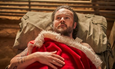 ‘It’s very much won us over’: Daniel Henshall’s bad Santa in A Sunburnt Christmas.