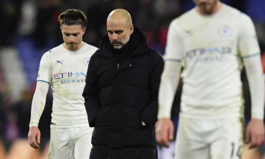 Pep Guardiola (centre) and Jack Grealish, one of City's false No 9s.