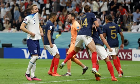 France players celebrate after a dejected Harry Kane put his second penalty of England’s 2022 World Cup quarter-final over the bar