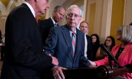 Mitch McConnell,John Barrasso,John Thune,Joni Ernst<br>U.S. Senate Minority Leader Mitch McConnell, R-Ky., center, is helped by, from left, Sen. John Barrasso, R-Wyo., Sen. John Thune, R-S.D., and Sen. Joni Ernst, R-Iowa, after the 81-year-old GOP leader froze at the microphones as he arrived for a news conference, Wednesday, July 26, 2023, at the Capitol in Washington. (AP Photo/J. Scott Applewhite)