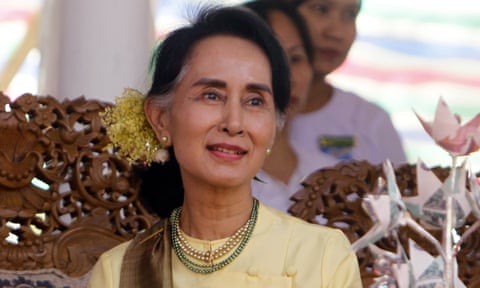 Aung San Suu kyi smiles during a ceremony in Naypyidaw, Myanmar.